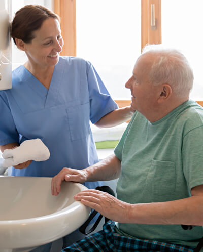 Caregiver helping hospital to home patient