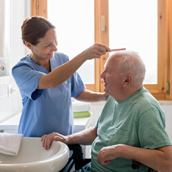 Nurse caregiver helping hospital to home patient