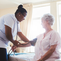 Nurse with nursing care patient